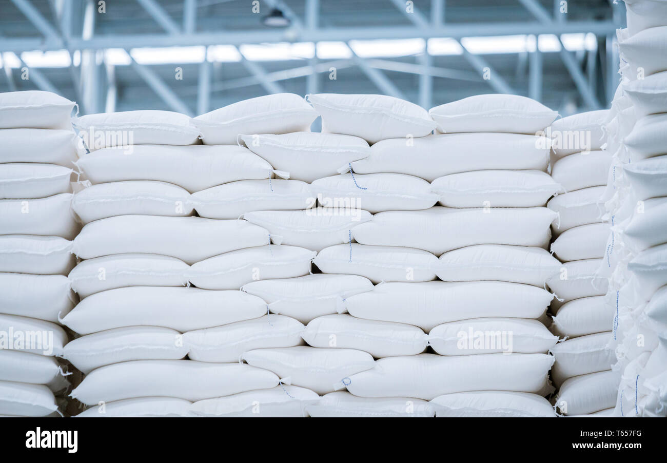stack of white bag in the warehouse Stock Photo - Alamy