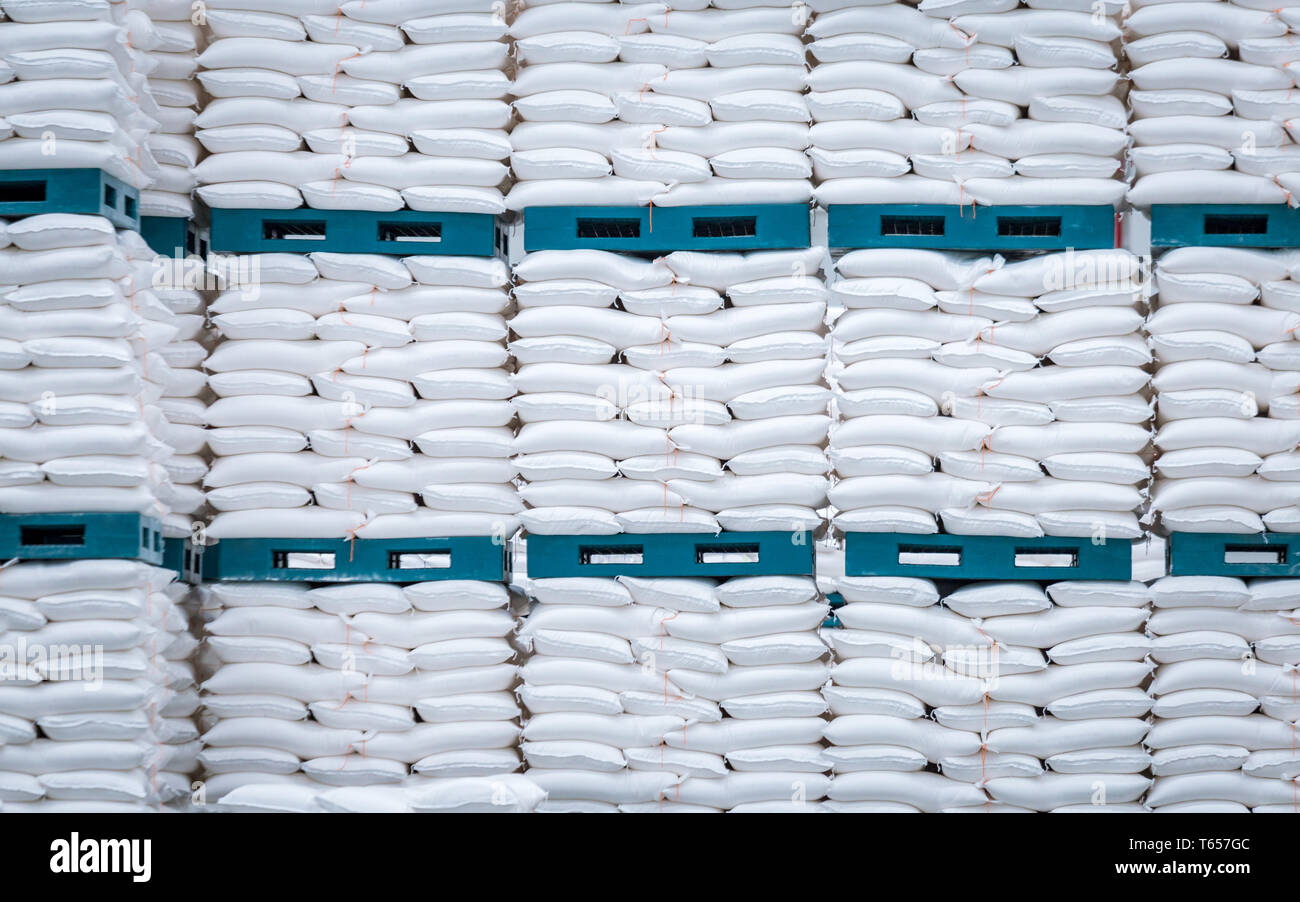 stack of white bag in the warehouse Stock Photo