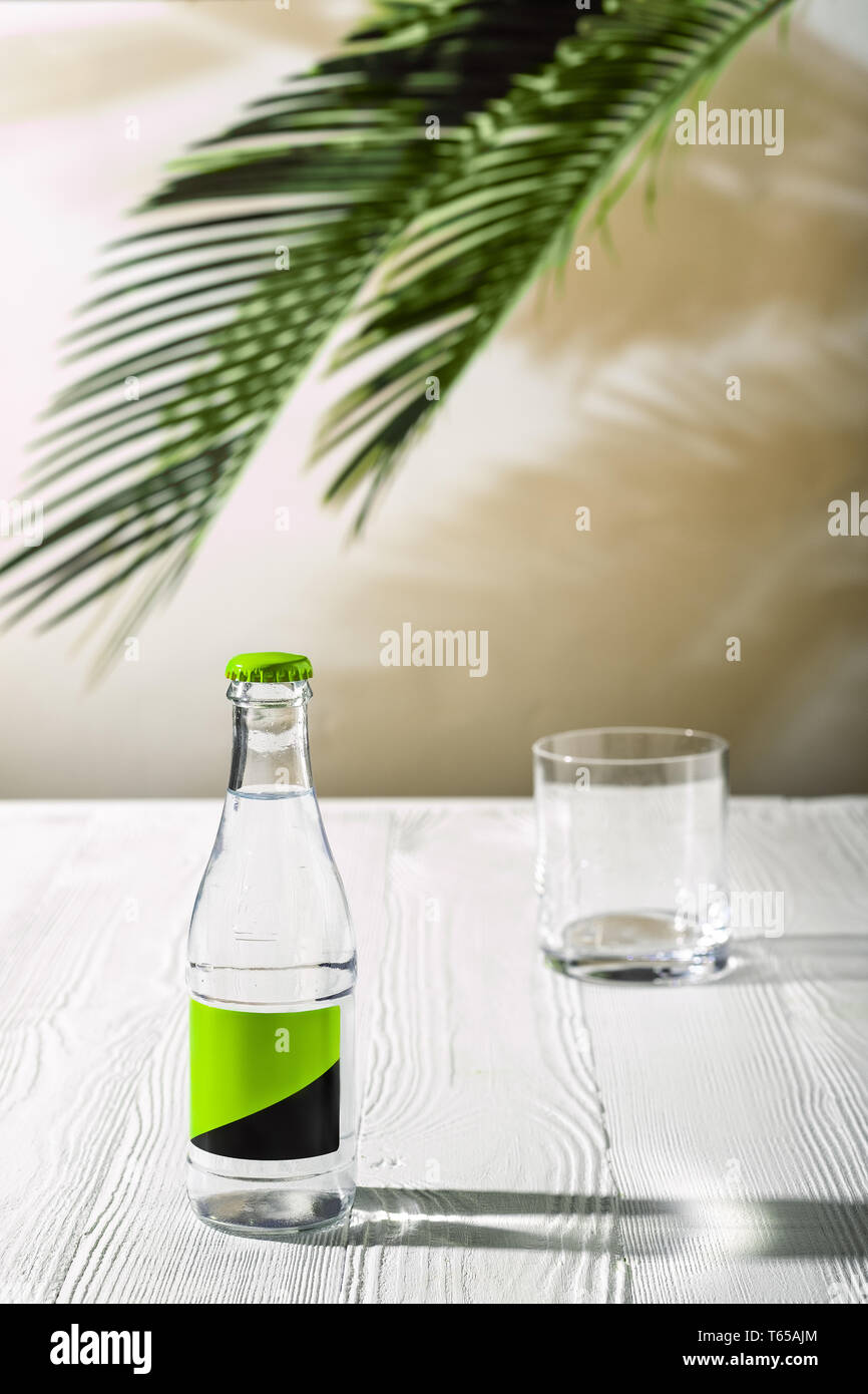 Download Empty Glass On The Table And Small Bottle Of Tonic Water In Background Under Morning Sunlight Stock Photo Alamy Yellowimages Mockups