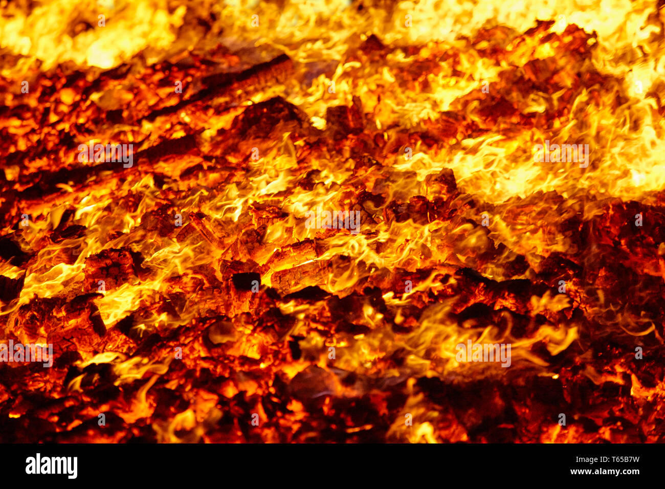 Fire. Volcano incandescent material. Hot charcoal bonfire. Carbon