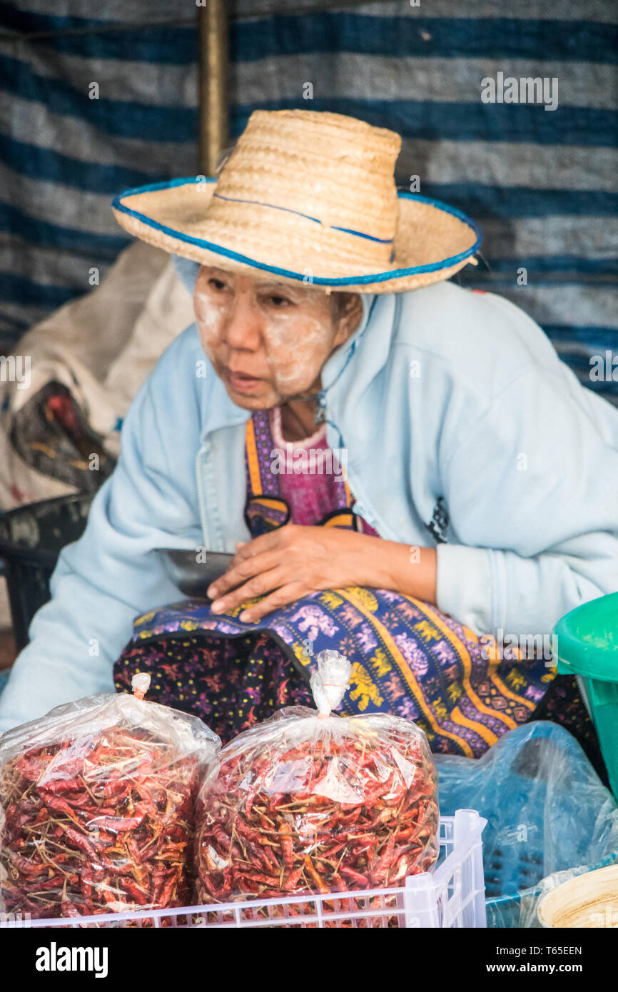 Woman selling chillies hi-res stock photography and images - Alamy