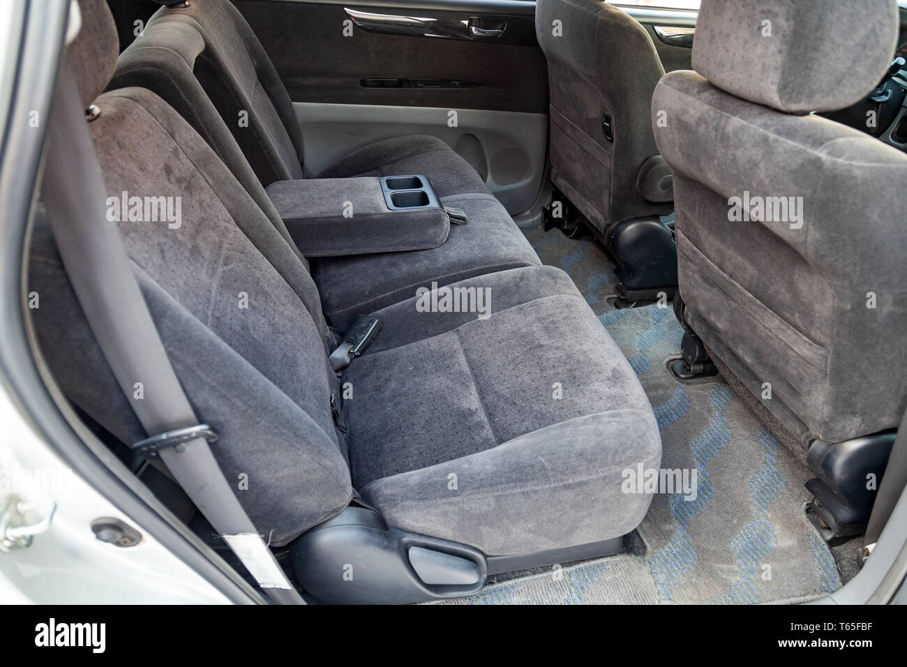 Close Up On Rear Seats With Velours Fabric Upholstery In The