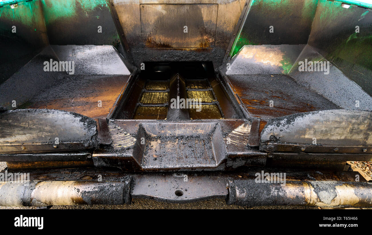 Asphalt spreading and paving machine, hopper view Stock Photo Alamy