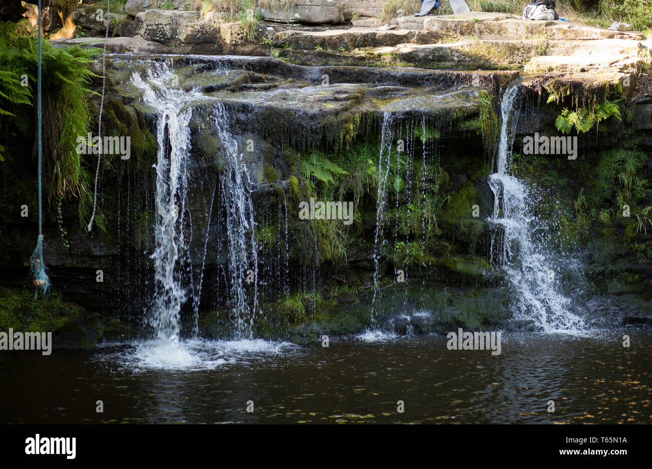 Lumb Hole Falls between Shackleton Moor and Hardcastle Crags is popular with wild swimmers and children Stock Photo