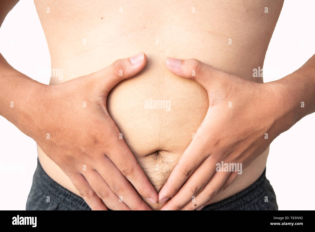 hand for heartshape on abdomen Stock Photo