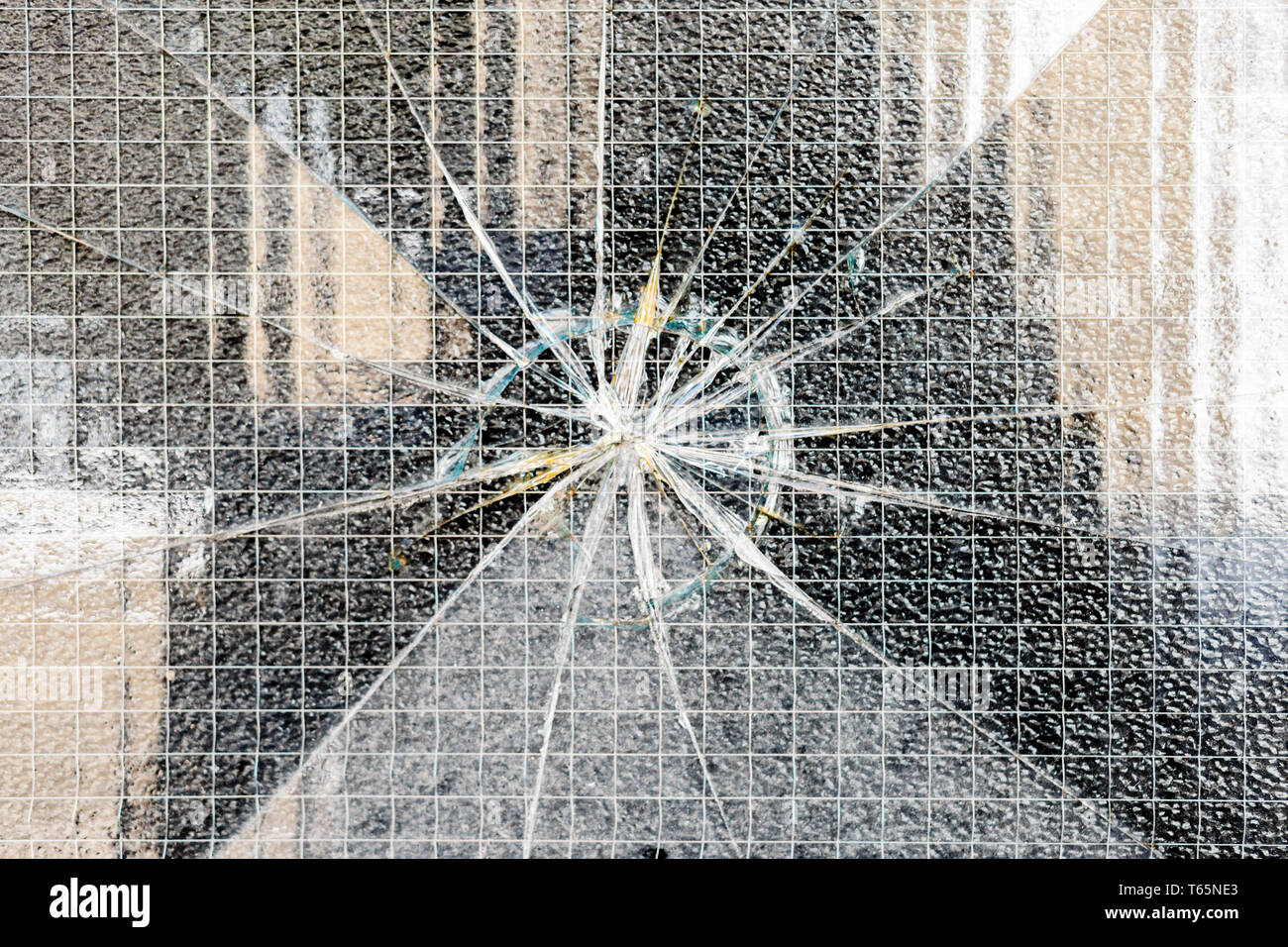 broken-wire-mesh-security-glass-T65NE3.jpg