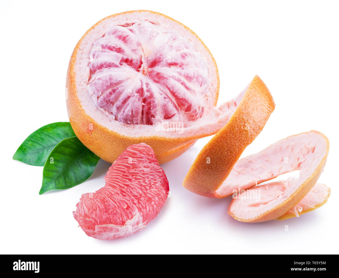 Half peeled grapefruit with green leaves isolated on white background Stock Photo Alamy