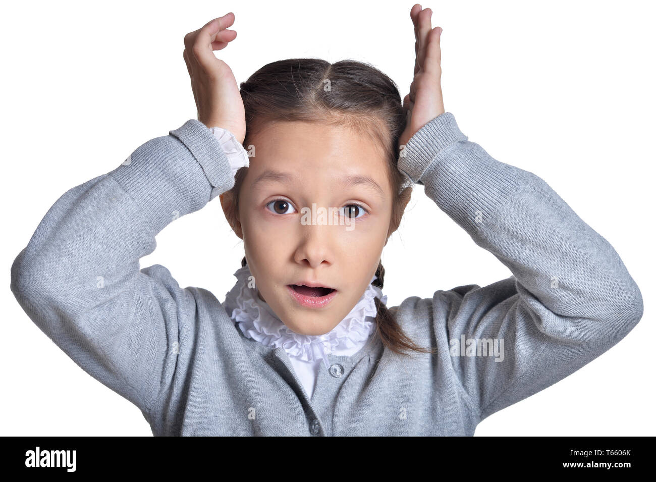 Portrait of cute little girl posing on white background Stock Photo - Alamy