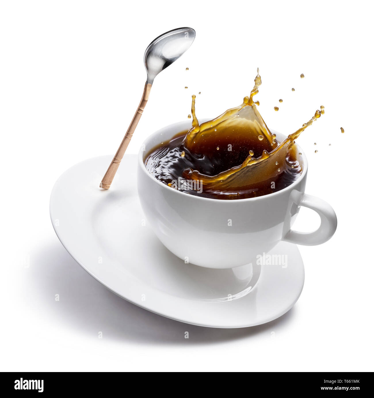 Splash of coffee in a form of crown in a white coffee cup. File contains clipping path Stock