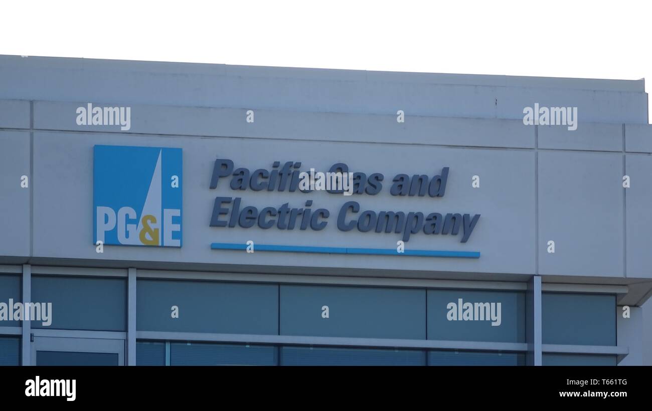 Close-up of logo atop headquarters of utility company Pacific Gas and Electric in San Ramon, California; the company faced bankruptcy in 2019 following wildfire liability concerns, March 12, 2019. () Stock Photo