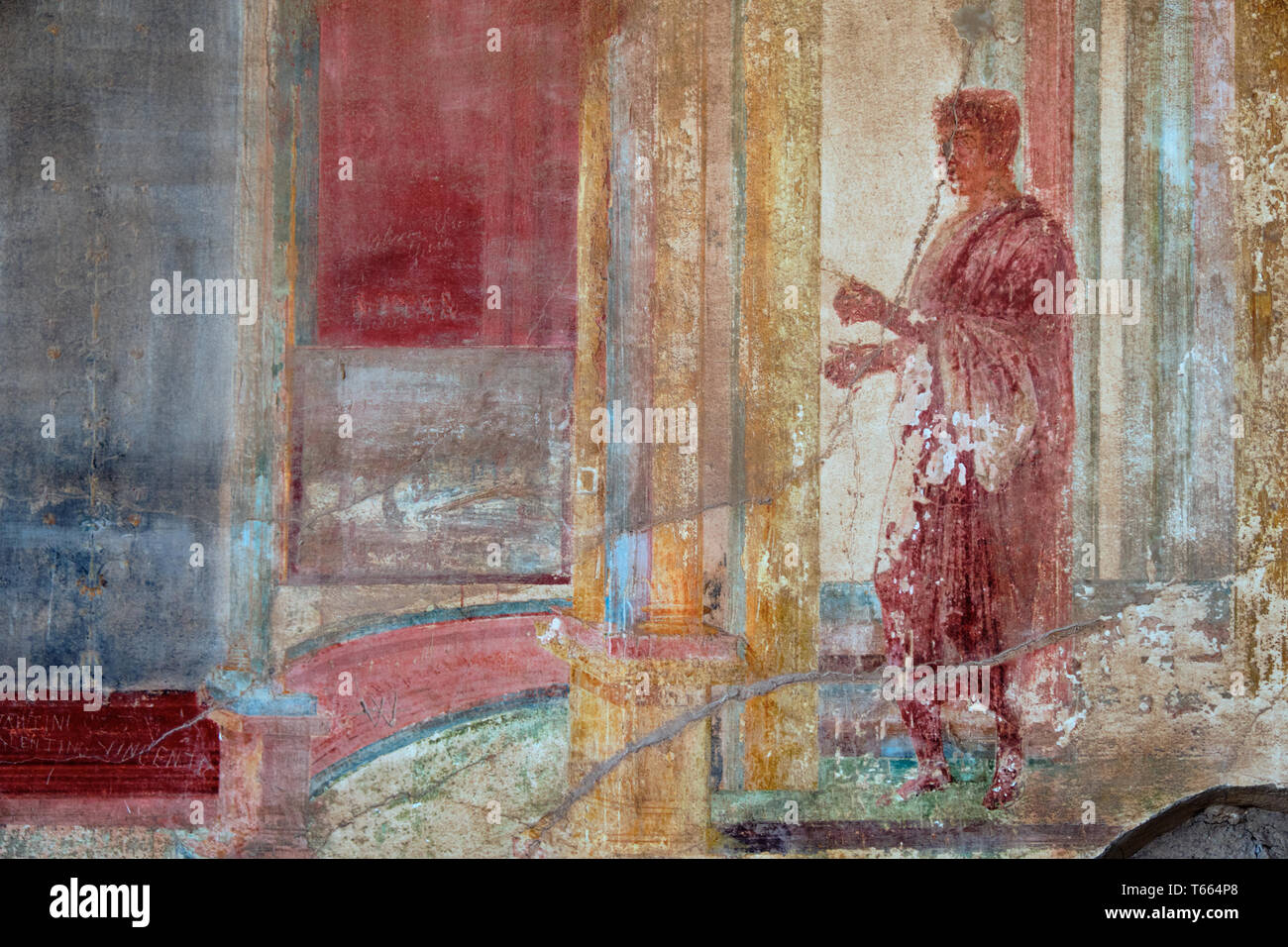 Clothing in ancient Rome, Figure of a Roman man painted in a Fresco in a Domus of Pompeii Stock Photo