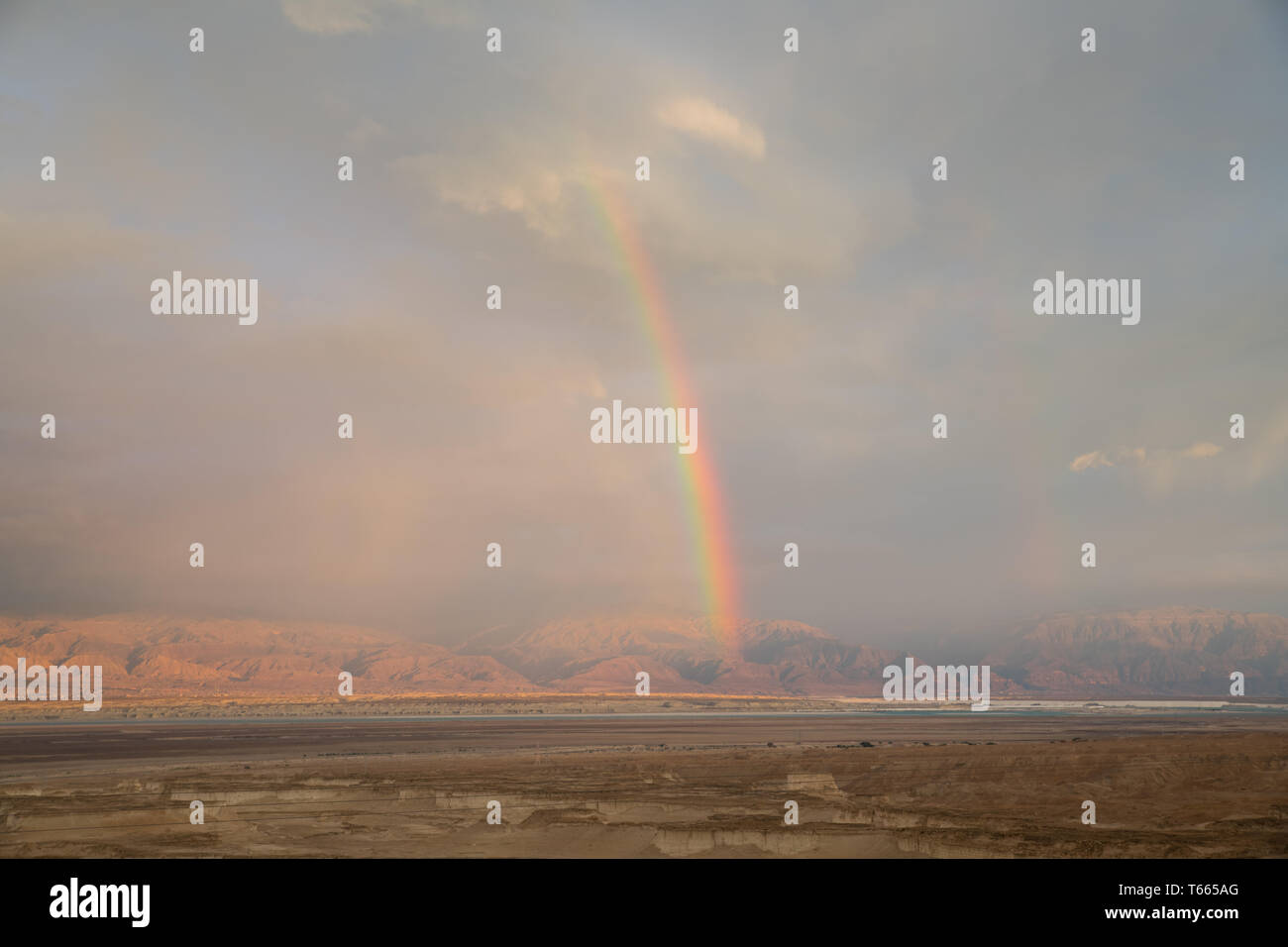 rainbow over the dead sea with jordan as background, view from masada Stock Photo