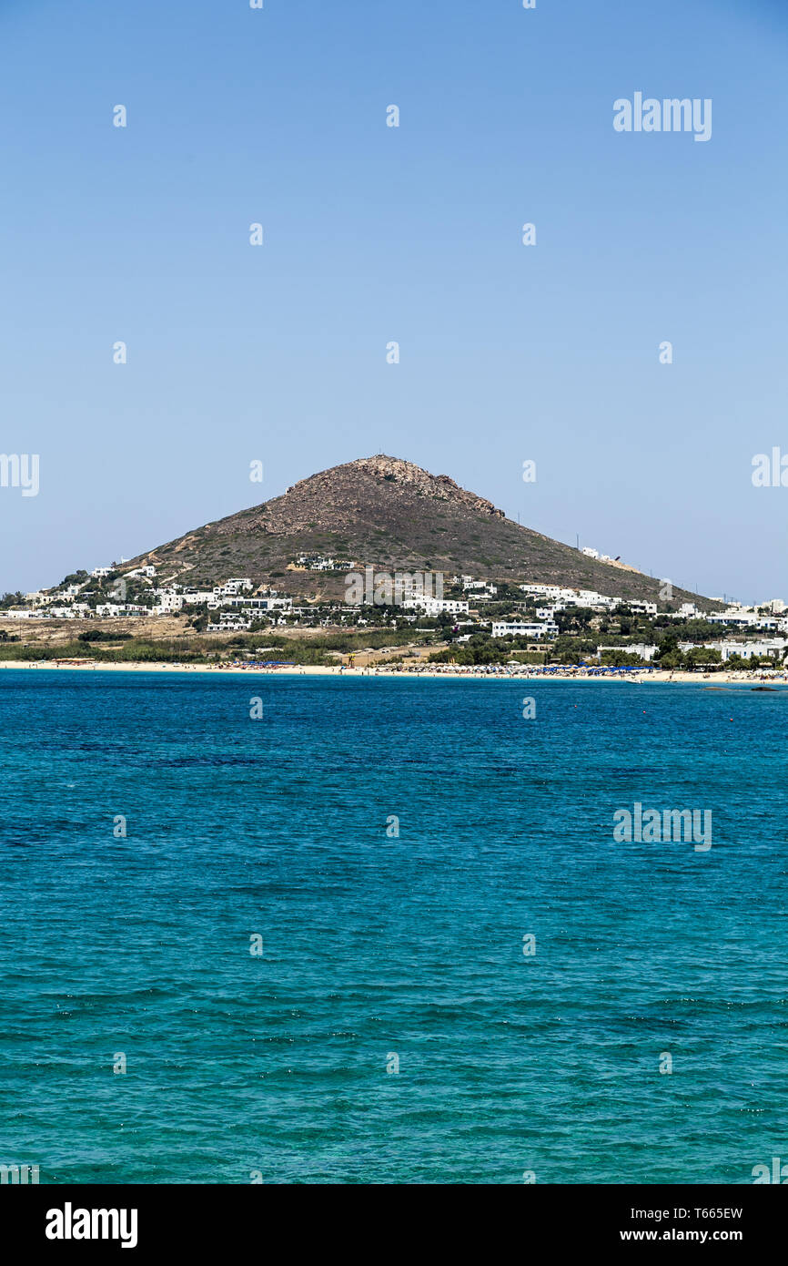 beautiful mountain with ocean in foreground, cloudless sky Stock Photo