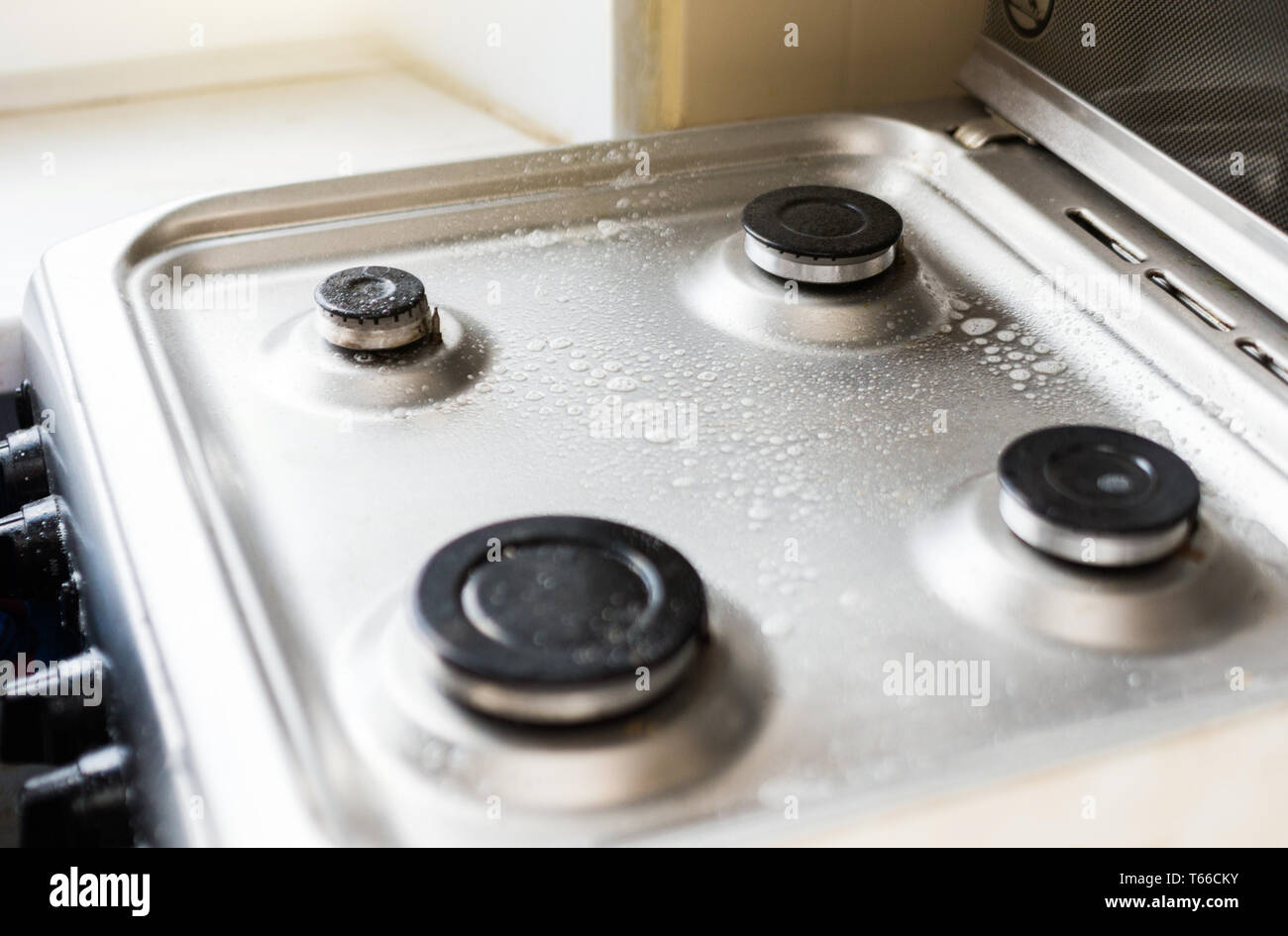 cleaning and washing the kitchen and various surfaces. Gas stove Stock