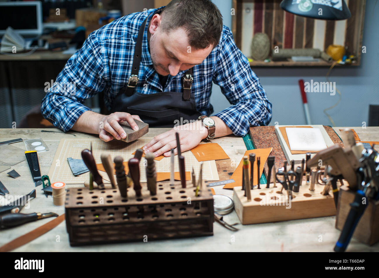 Man making leather goods hi-res stock photography and images - Alamy
