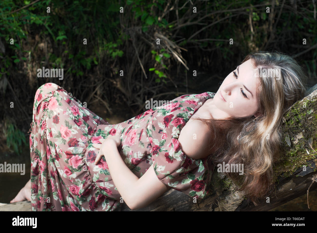 Beautiful girl in the national dress stand in the Stock Photo Alamy
