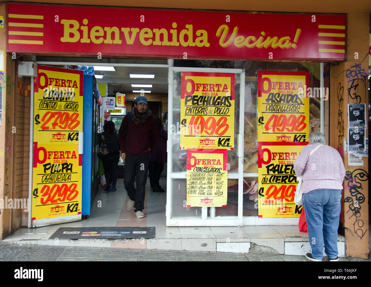 In downtown Valparaiso  a grocery store blares its offerings and competitive prices shown in Chile pesos Stock Photo