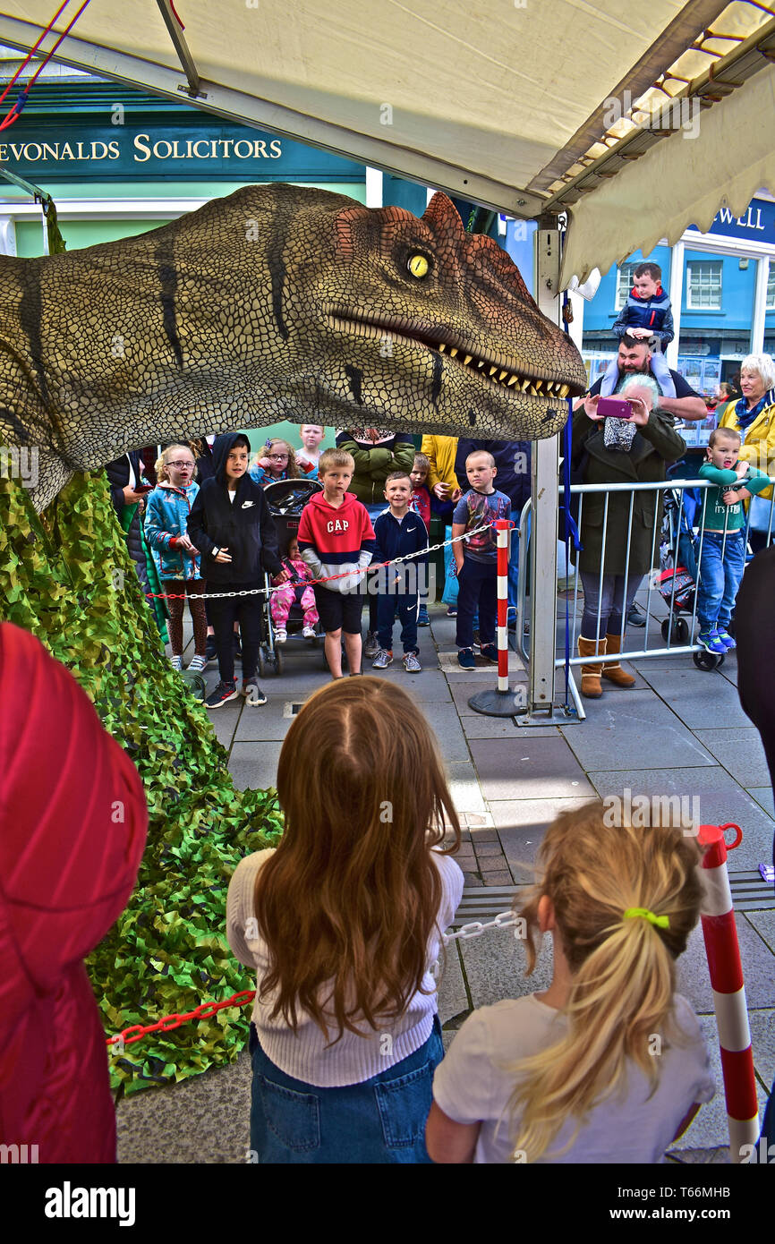 A dinosaur brought to life! 'Little Al' enthralled the crowds of adults and children on Thursday April 25th 2019, in Dunraven Place in Bridgend, Stock Photo