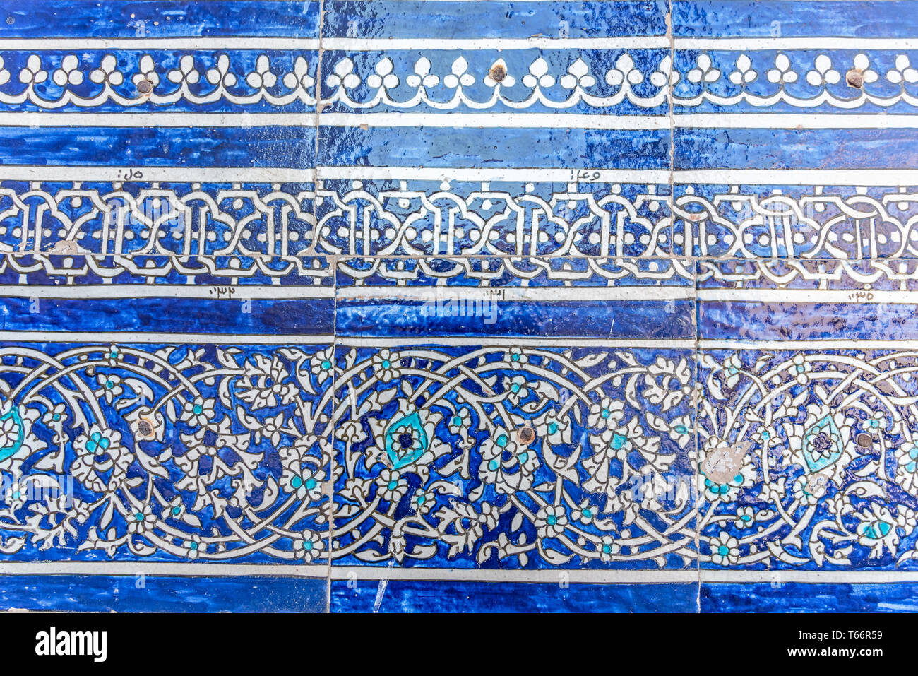 Details of glazed tiles in a mosque in Usbekistan. Stock Photo