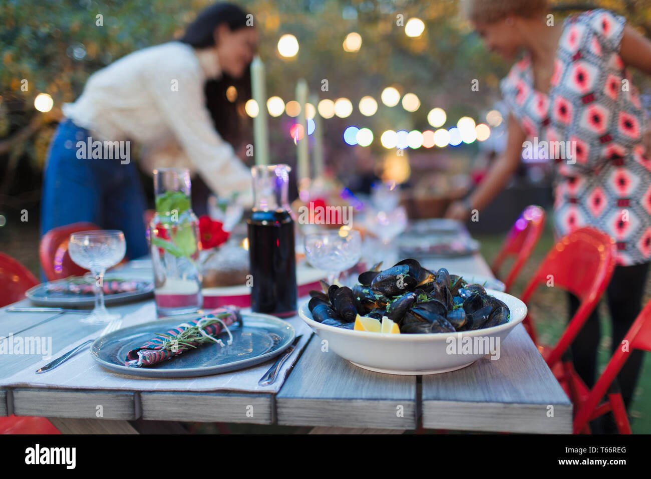 Mussels on dinner garden party table Stock Photo