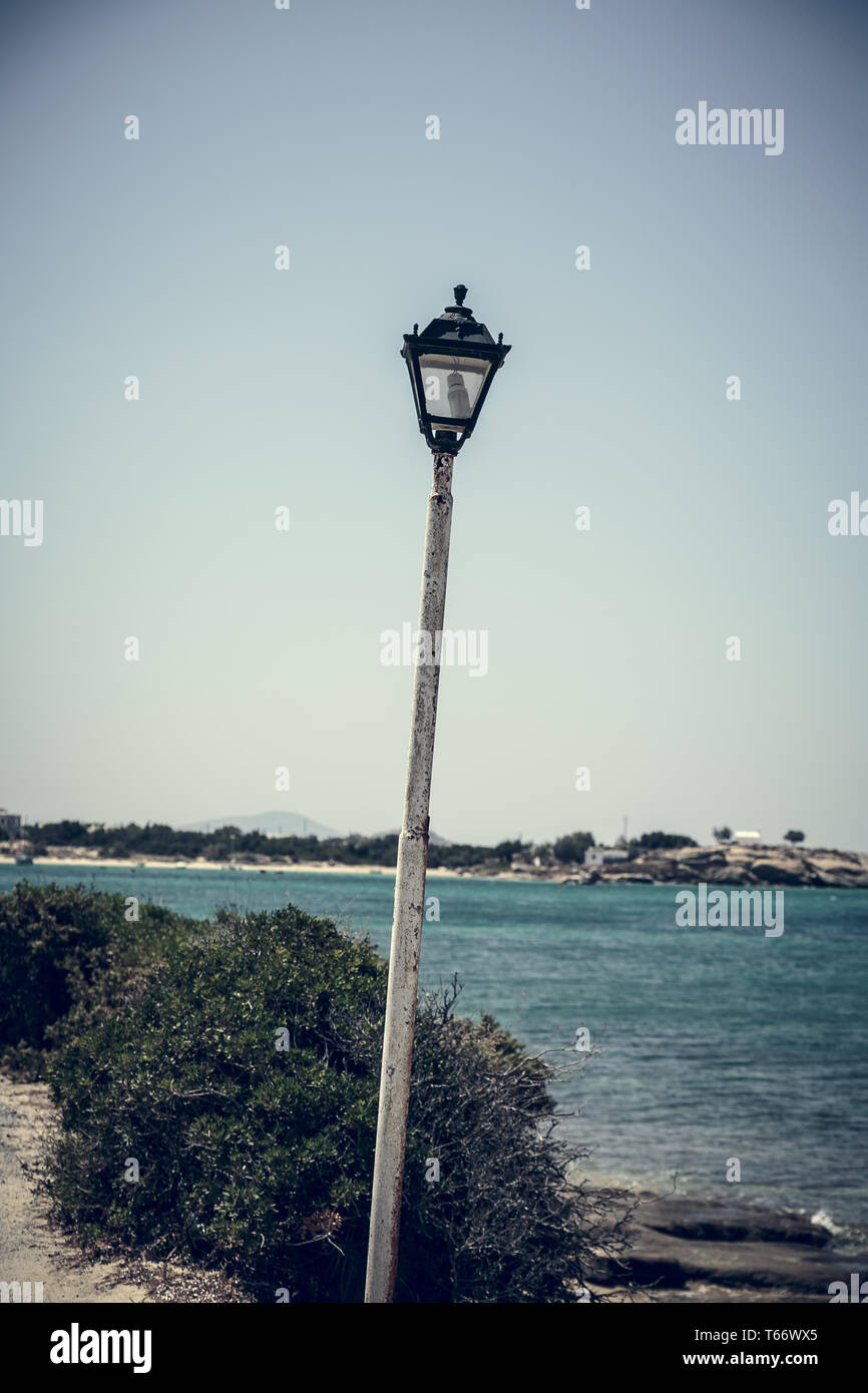 old vintage street light in front of the ocean Stock Photo