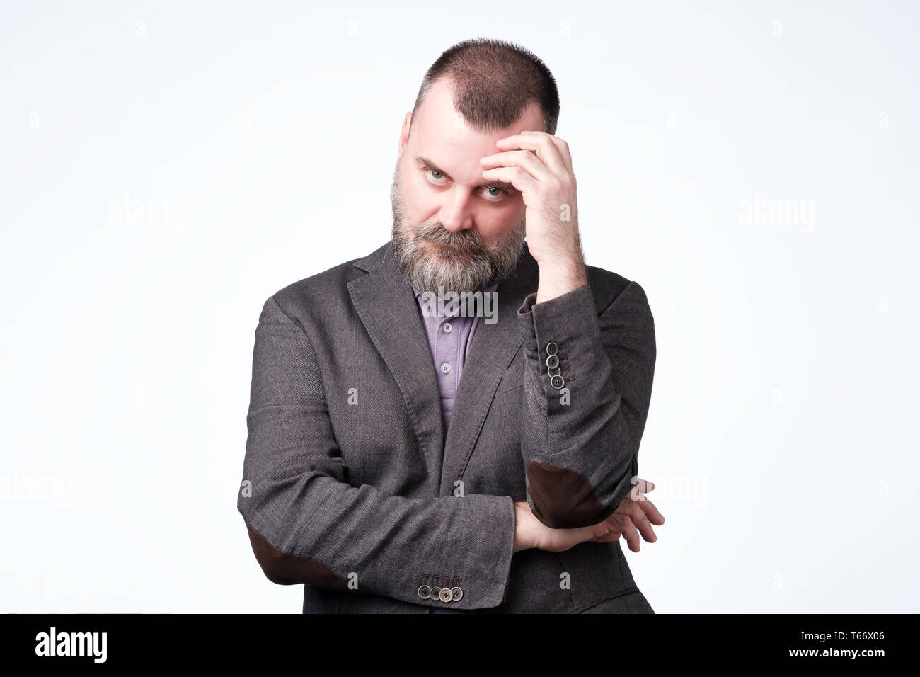 Mature caucasian man thinking about his life problem. Stock Photo