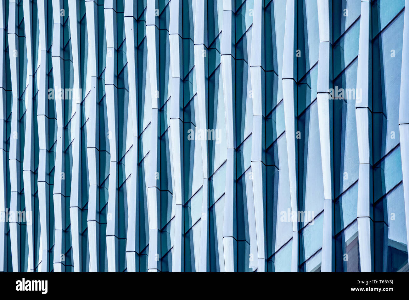 Architectural abstract, a modern office building with glass and windows in London Stock Photo