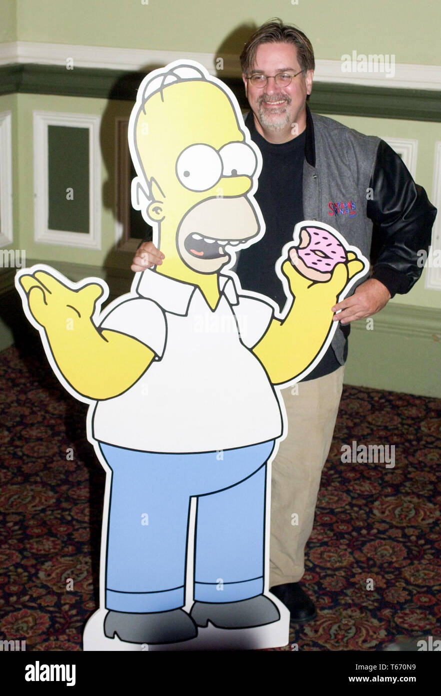 Celebrating ten years of The Simpsons on Sky One, The Simpsons Mania Tour started at The Assembley Rooms in Edinburgh tonight, Monday 14/8/00.  The voices behind the characters performed a rare live read of one of the scripts aided by the series creator Matt Groening. Matt is pictured with his character Homer. Stock Photo