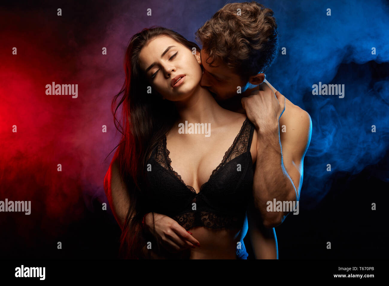 man biting his woman while having sex. close up photo Stock Photo - Alamy