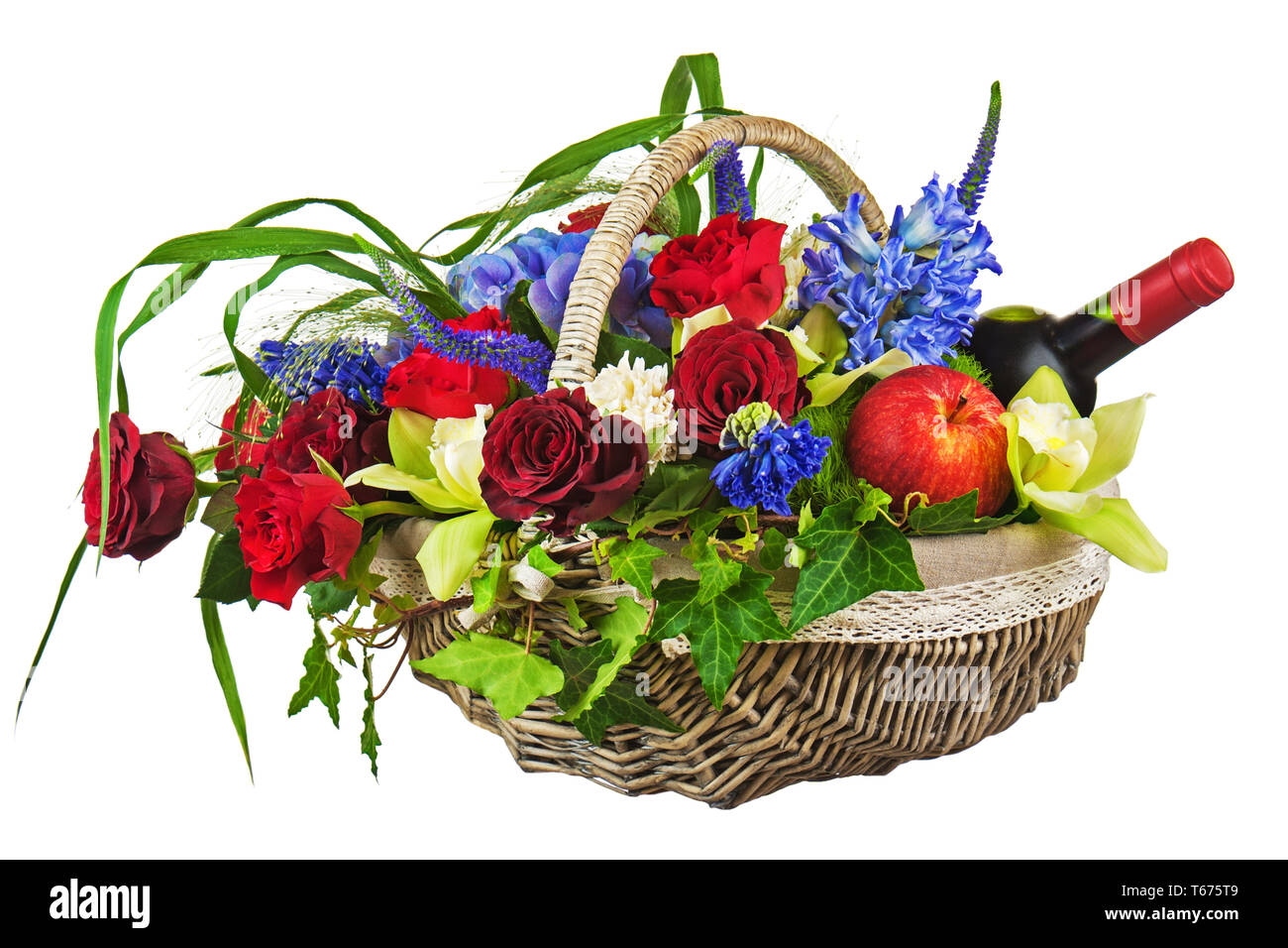 Flower arrangement of roses, orchids, fruits and b Stock Photo