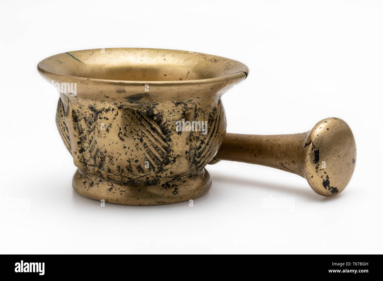 Old bronze mortar. Isolated on white background. Top view Stock Photo