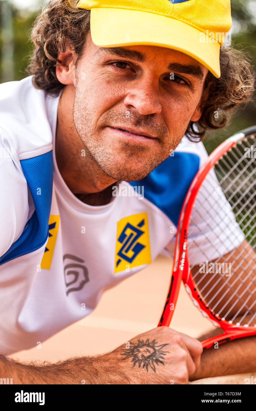 Gustavo Kuerten holding his racket on the court of Federacao Catarinense de  Tenis. Florianopolis, Santa Catarina, Brazil Stock Photo - Alamy