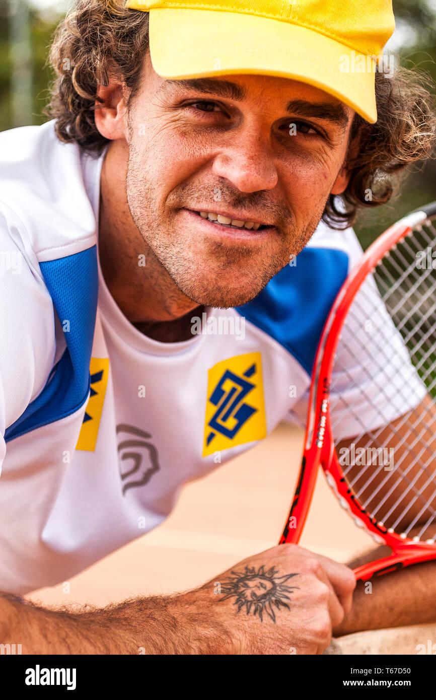 Gustavo Kuerten holding his racket on the court of Federacao Catarinense de  Tenis. Florianopolis, Santa Catarina, Brazil Stock Photo - Alamy