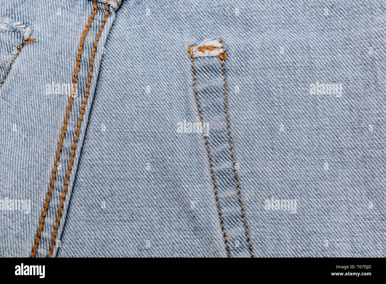 Jeans inside with seam closeup texture. jeans denim texture and background. Wrong side of black jeans fabric. Selectibe fokus, place for text. Stock Photo