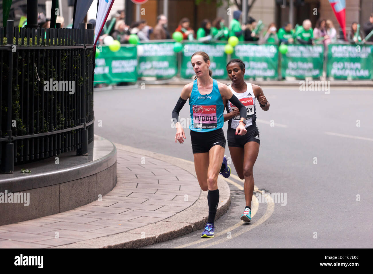 Elite Femal Athletes, Molly Huddle (USA), and Haftamnesh Tesfay (ETH),  competing in the 2019 London Marathon. Molly went on to finished 12th in  a time of 02:26:33 Stock Photo