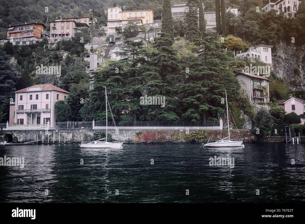 Villages on the hills in the evening. Old Village on Lake Como, Italy.Como lake is the most beautiful city around the lake.This is the most beautiful Stock Photo