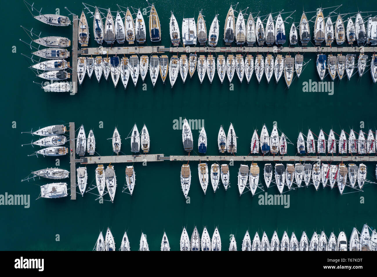 Aerial view of a lot of white boats and yachts moored in marina. Photo ...