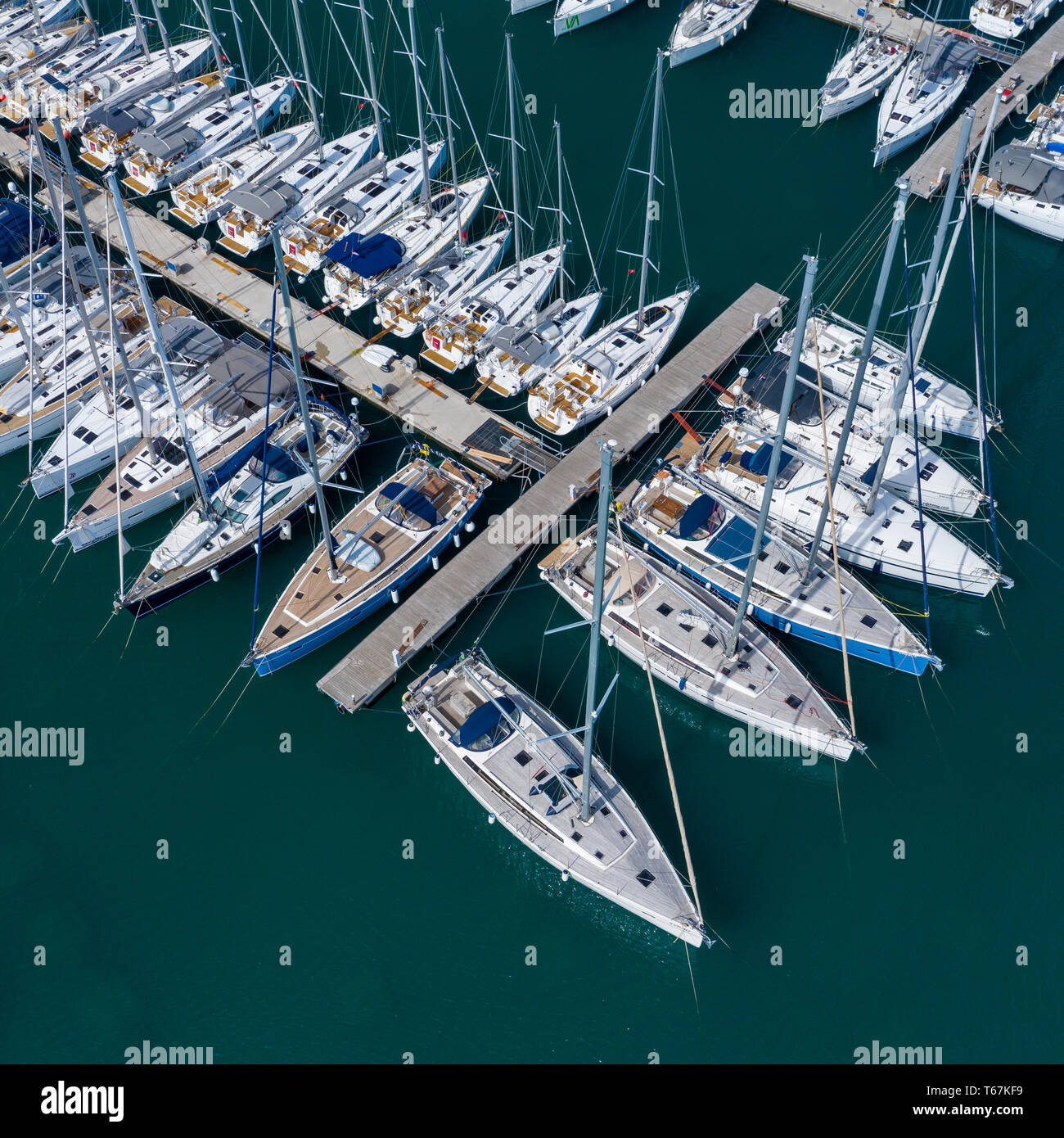 Aerial view of a lot of white boats and yachts moored in marina. Photo ...