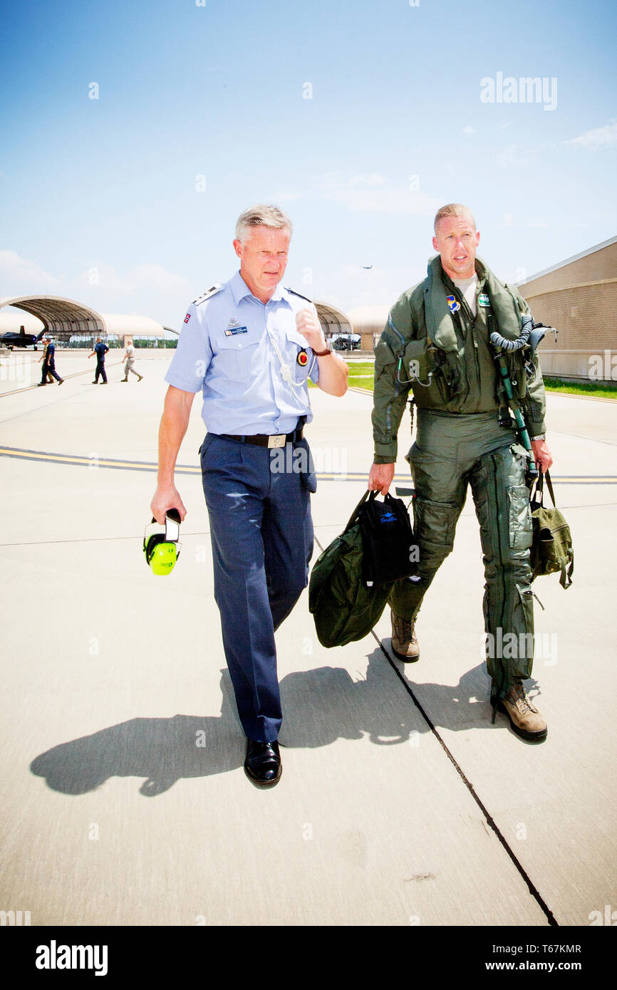 Colonel in the Norwegian Air Force, Helge T. Markussen, talks to US pilot Brad Turner after Turner's first mission in a F-35 Fighter Jet at the Eglin Air Force Base. Norway is one of the countries who have committed to buy the new jet fighter for it's Air Force. Stock Photo