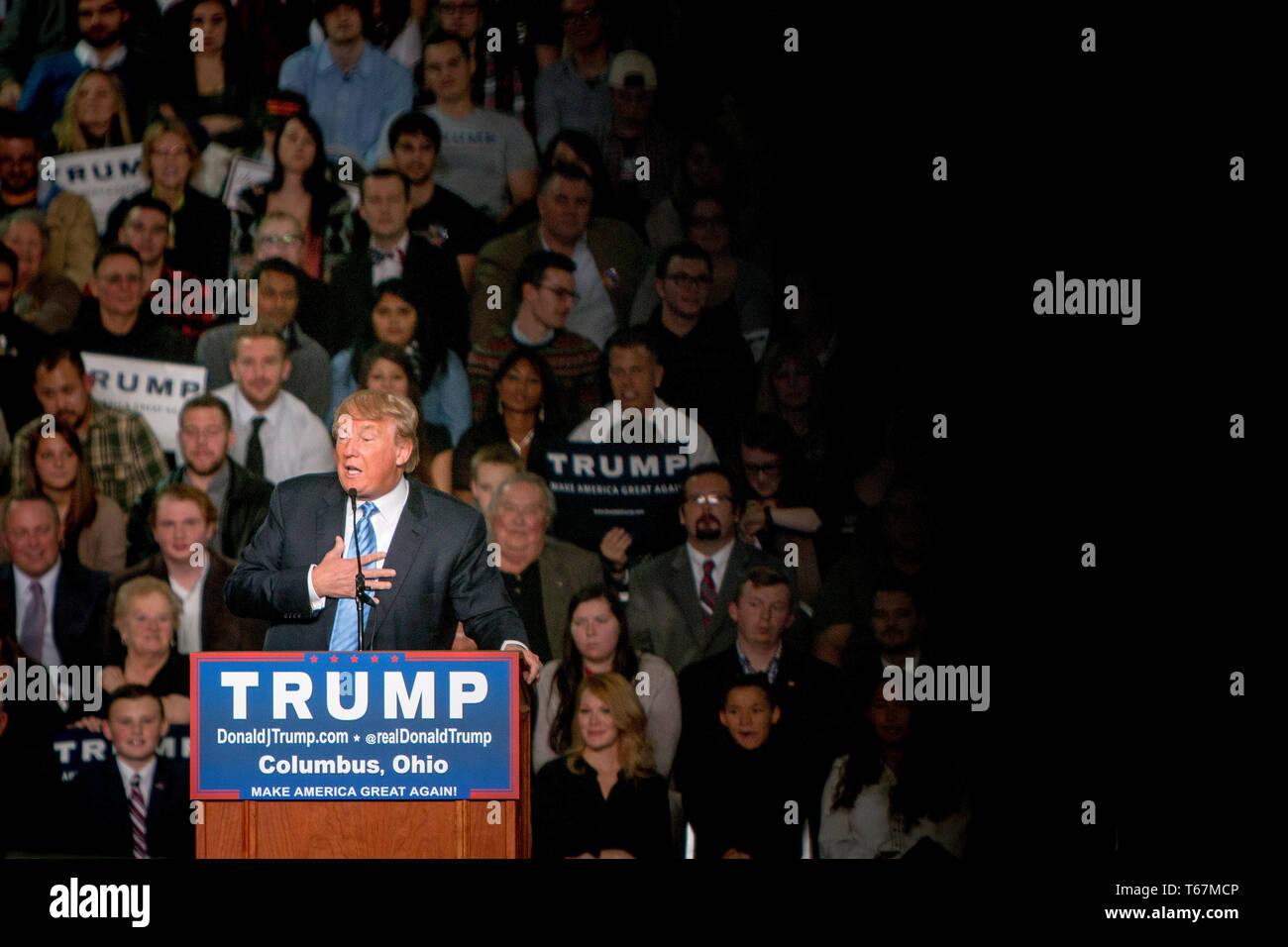 Presidential hopeful Donald Trump (R) speaks at a campaign event at the Arena Convention Center in Columbus. Stock Photo