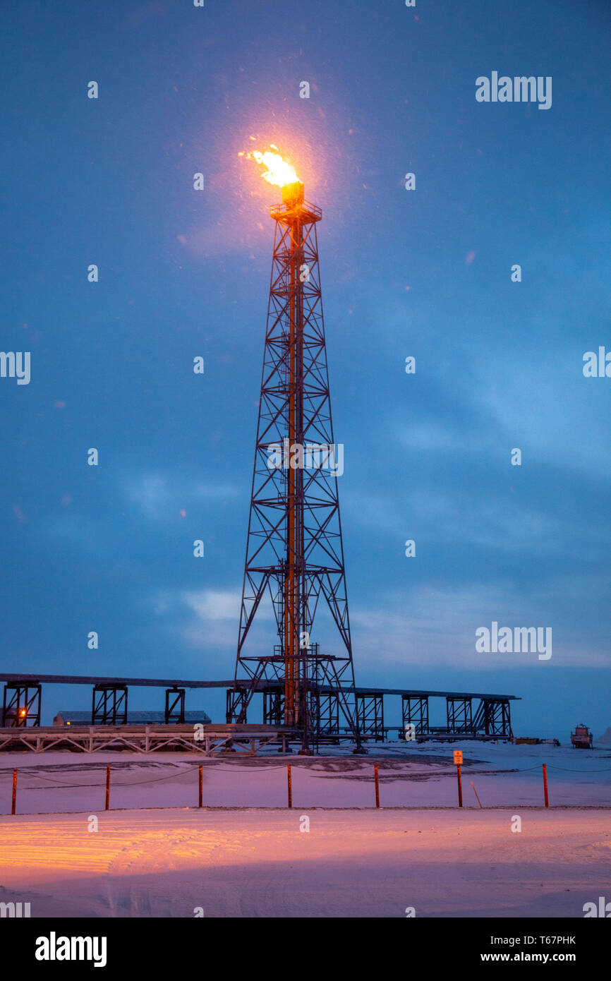 A pilot flame at the oil production facility on the artificial island