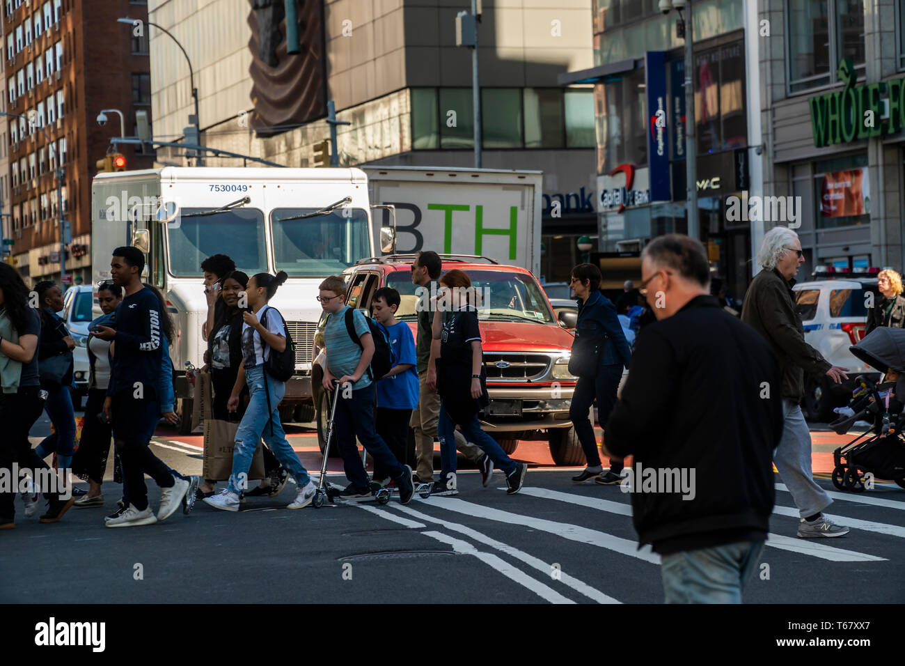 Traffic on 14th Street in New York on Wednesday, April 24, 2019. Because of the L train shutdown the city will ban private car through traffic between Third and Ninth Avenues on the thoroughfare. Buses will have priority as they shuttle commuters who would normally take the L train. The train service will be disrupted as necessary repairs on the Canarsie Tunnel take place starting Friday. The surface restrictions will start in June.  (© Richard B. Levine) Stock Photo