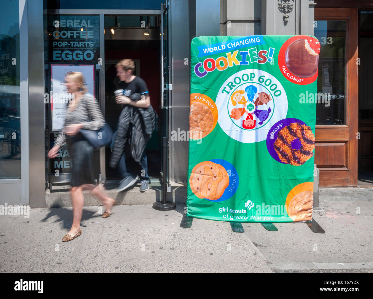 A sign outside the Kelloggâ€™s restaurant in Union Square in New York on Tuesday, April 23, 2019 announces the sale inside of Girl Scout Cookies by Troop 6000, which consists of homeless girls. (Â© Richard B. Levine) Stock Photo