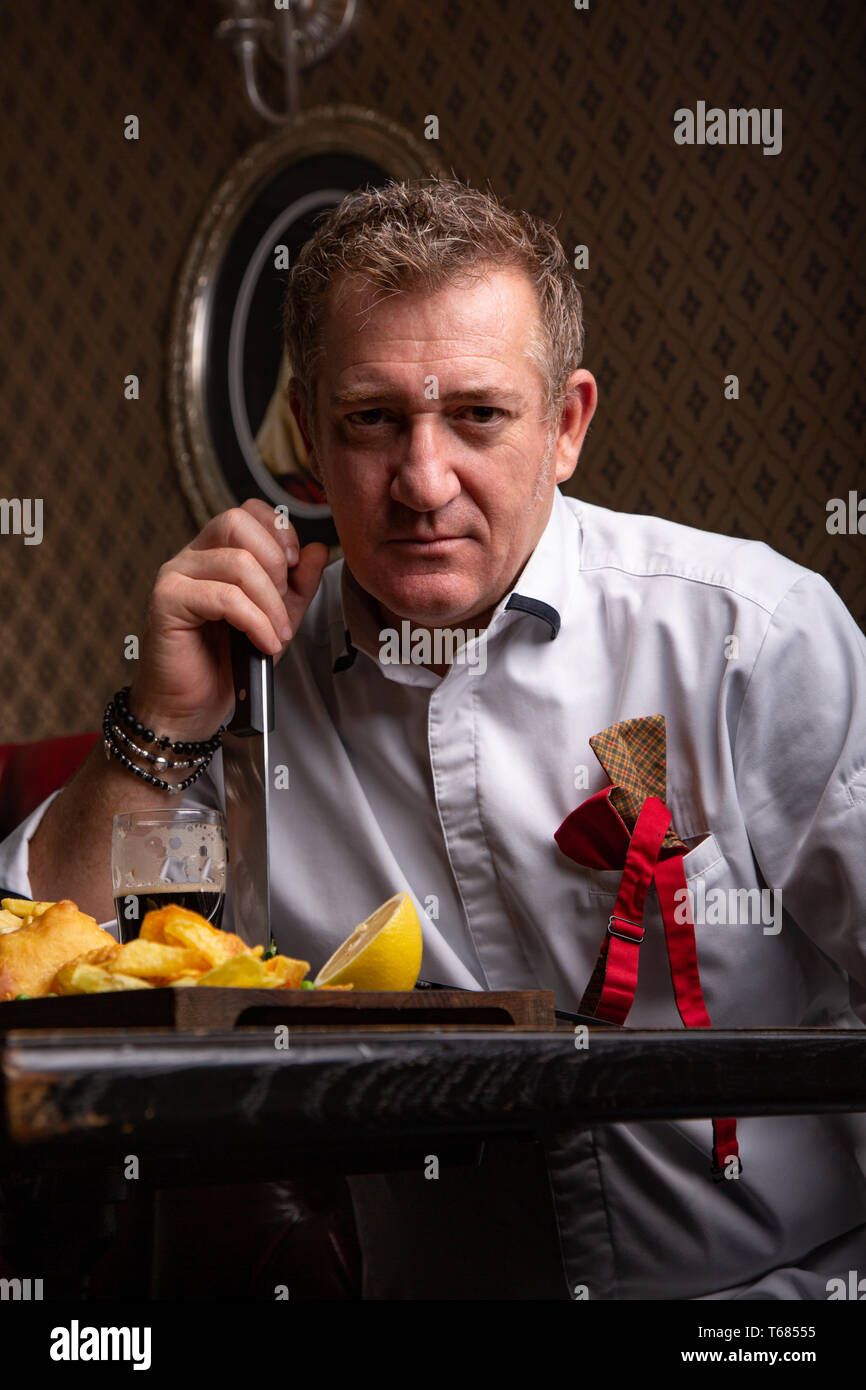 Fabulous at any age. Portrait of fashionable 50-year-old man in stylish siut posing at restaurant. Trendy haircut, glossy grey hair. Close up Stock Photo - Alamy Fabulous at any age. Portrait of fashionable 50-year-old man in stylish siut posing at restaurant. Trendy haircut, glossy grey hair. Close up Stock Photo - Alamy