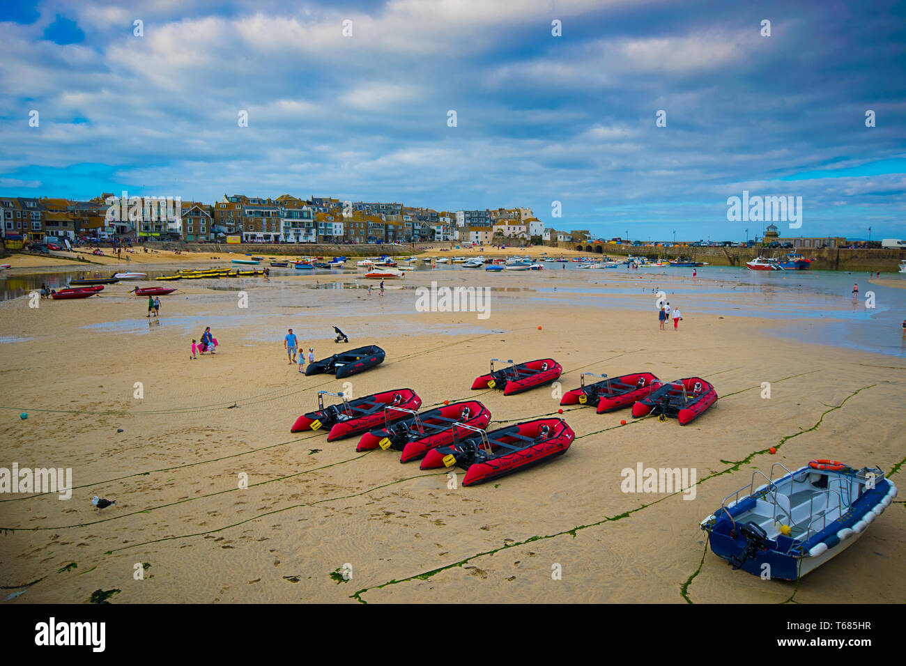 Dinghy style hire boats on the shore of St Ives, Cornwall, UK. Stock Photo