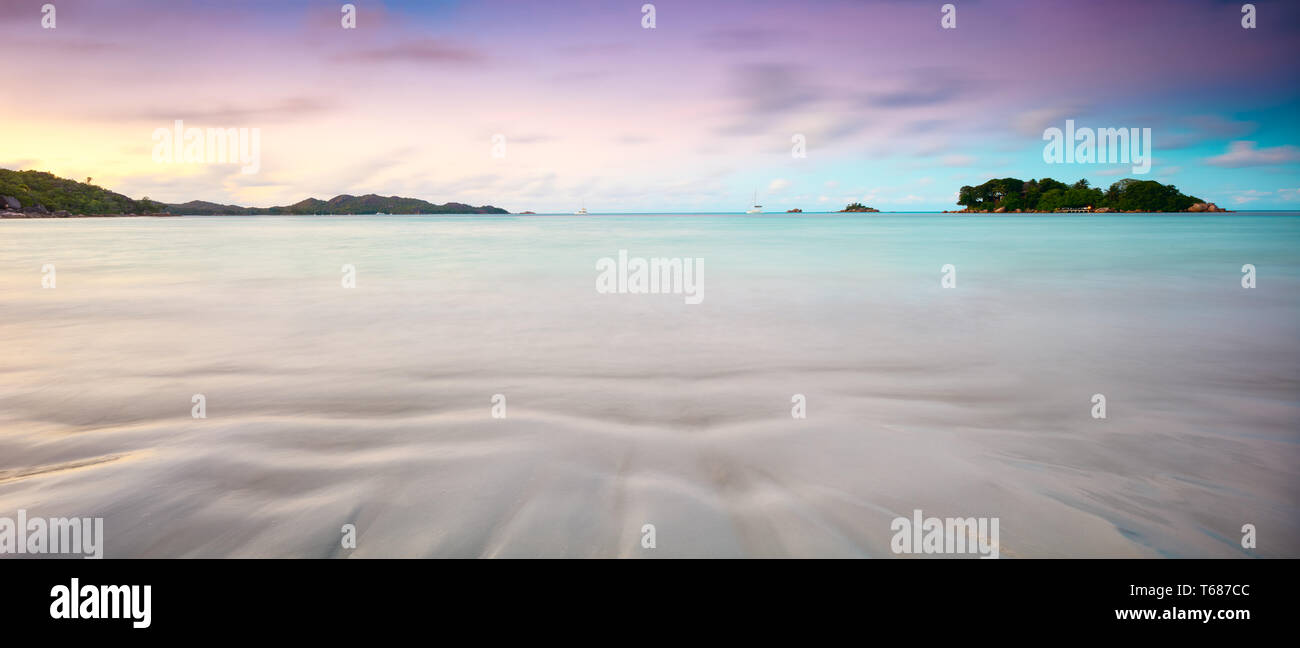 Art Beautiful sunset over the tropical beach Stock Photo - Alamy