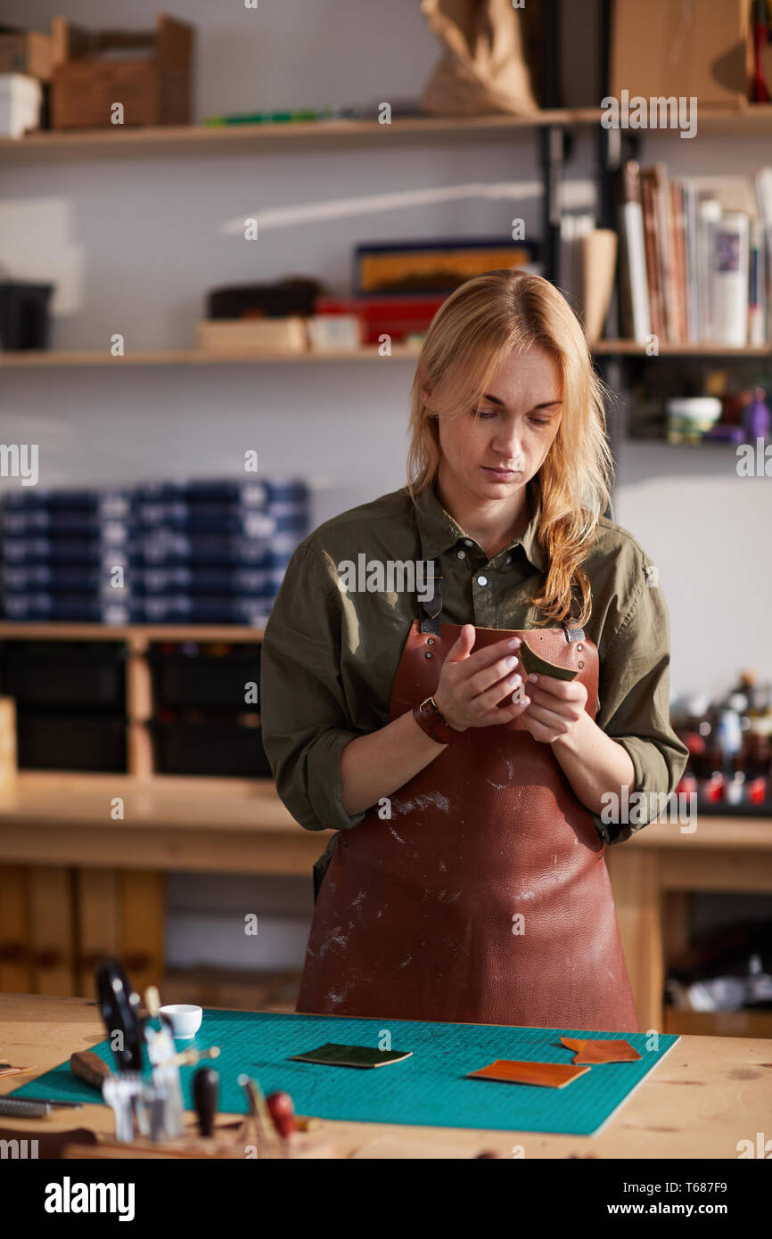 Blonde woman in leather hi-res stock photography and images - Alamy