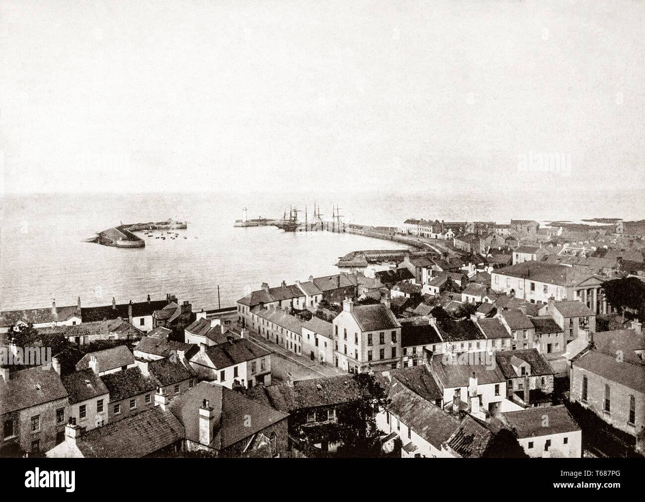 Late 19th Century views of Donaghadee in County Down, Northern Ireland is probably best known for its harbour, for centuries, it has been a haven for ships from at least the 17th century.  The new harbour was started in 1821 by John Rennie Senior, the celebrated engineer whose works included London Bridges over the Thames. Stock Photo