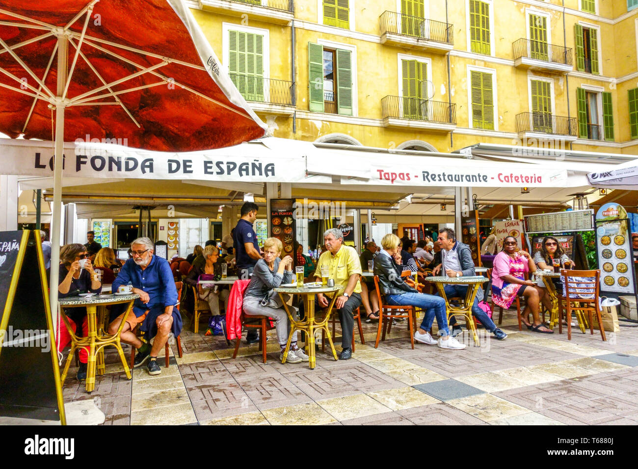 Palma de Mallorca Old Town People in tapas bar on  Plaza Mayor, Placa Major in Palma de Mallorca, Spain Europe Stock Photo