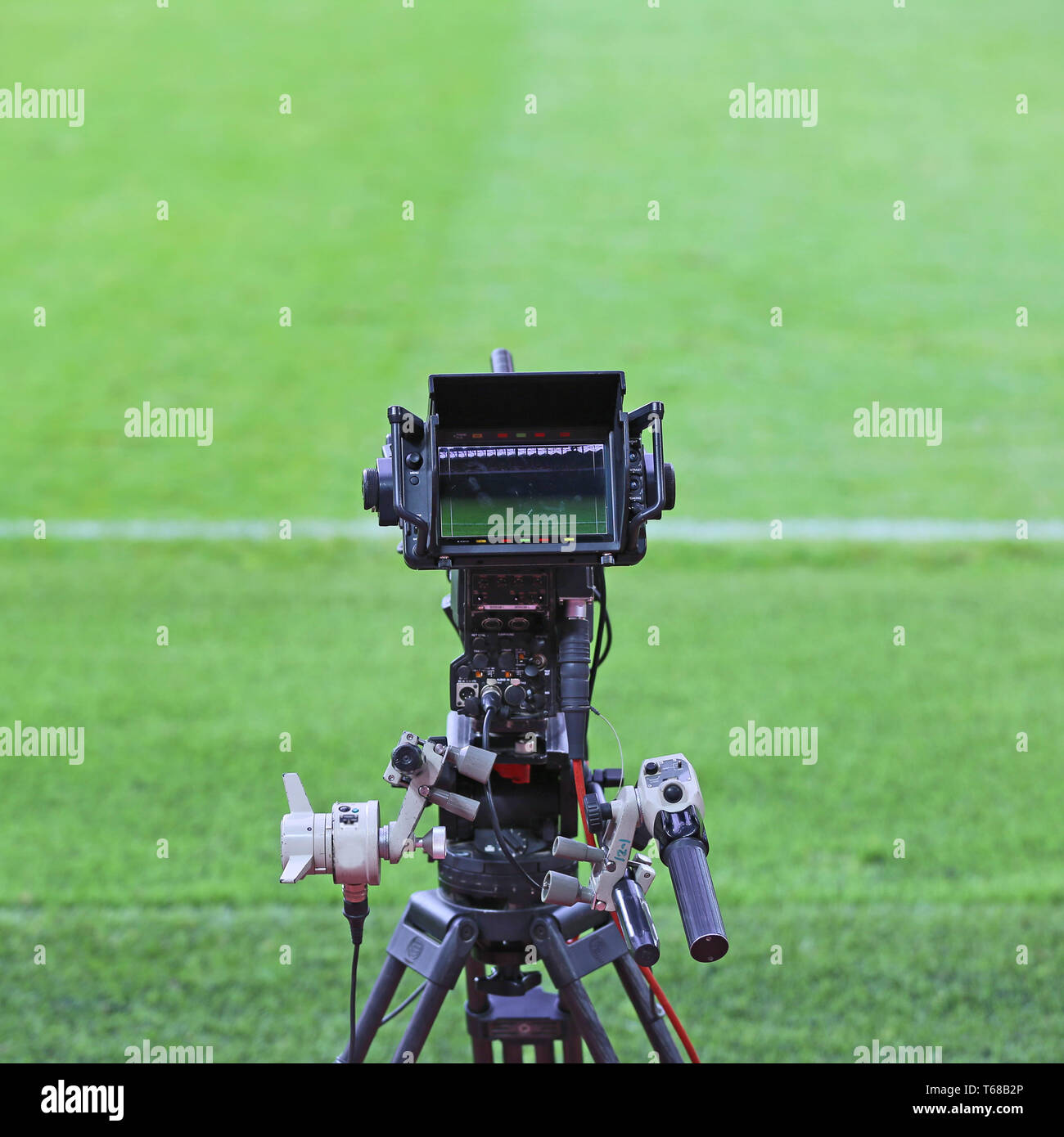 TV camera on football field Stock Photo Alamy